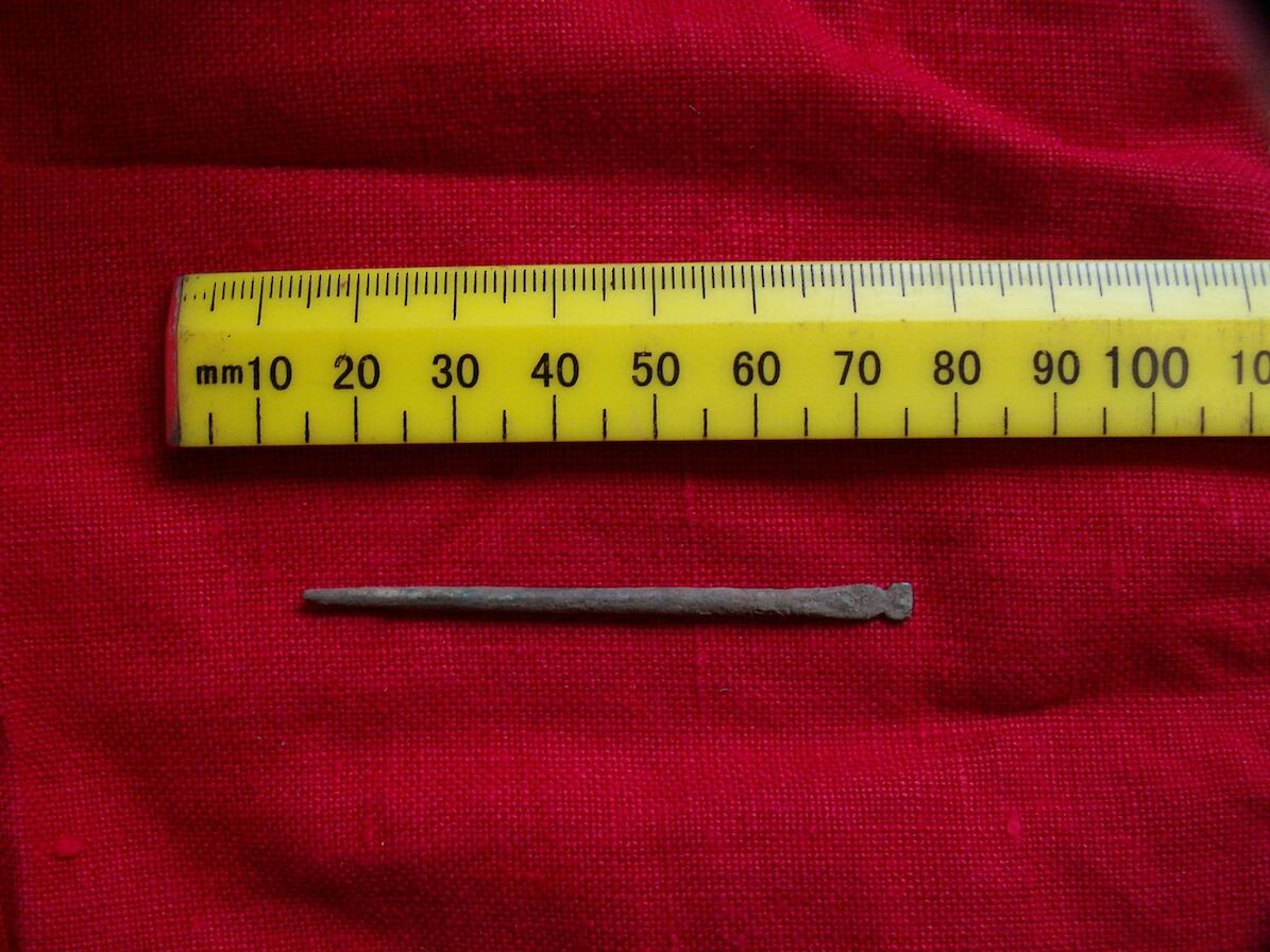 Bronze pin found in Structure E