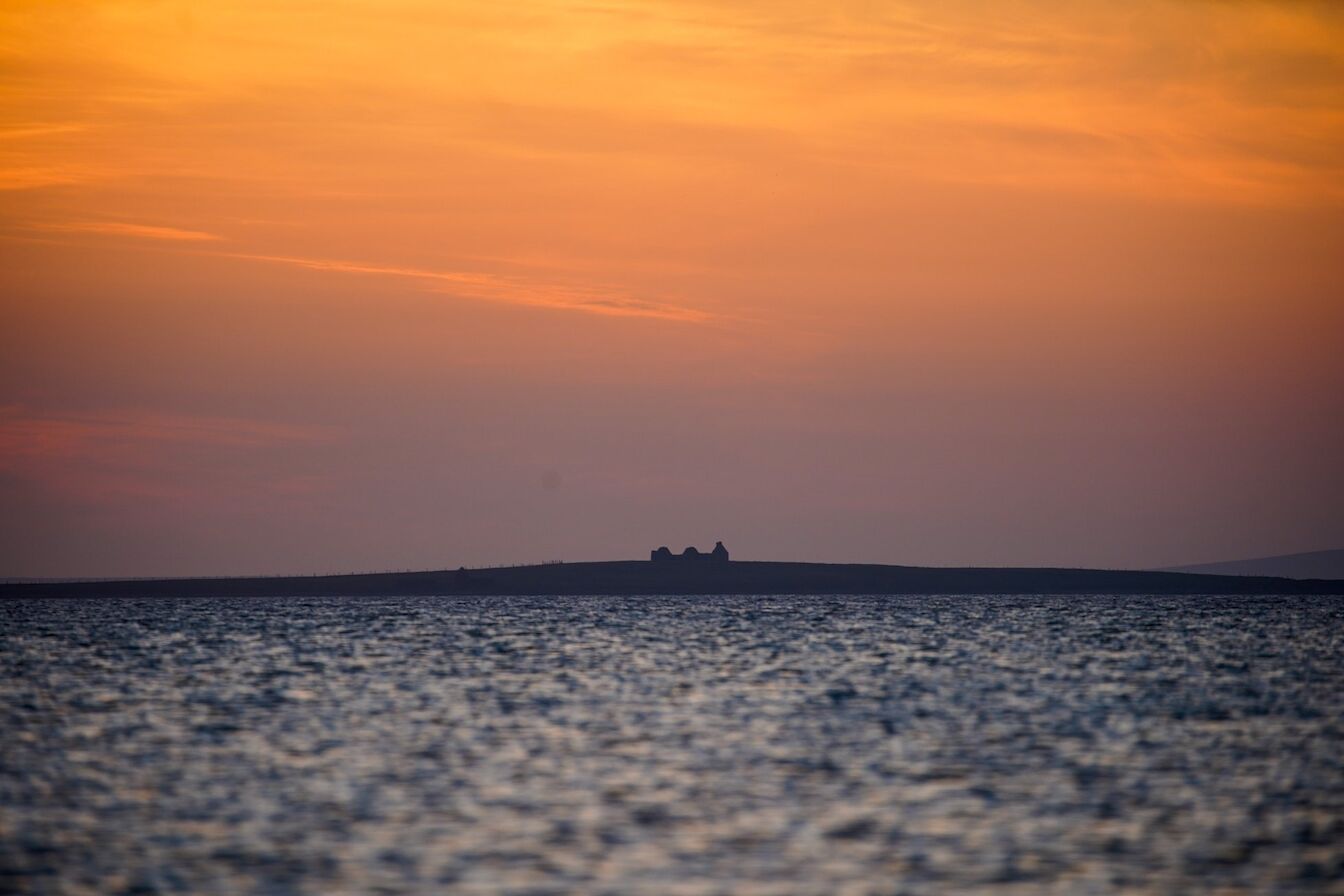 Last light over Linga Holm, Stronsay - image by Iain Johnston