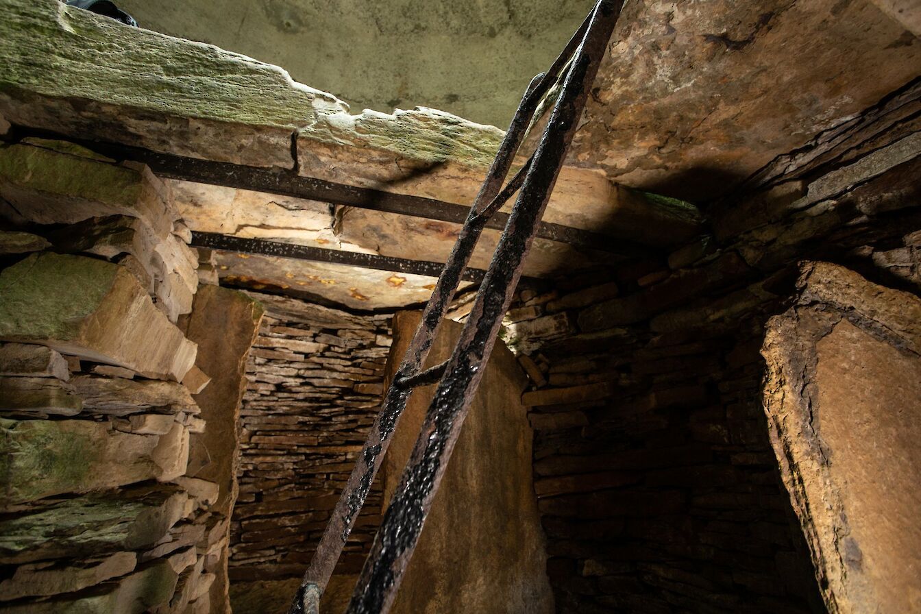 Inside the Taversoe Tuick, Orkney