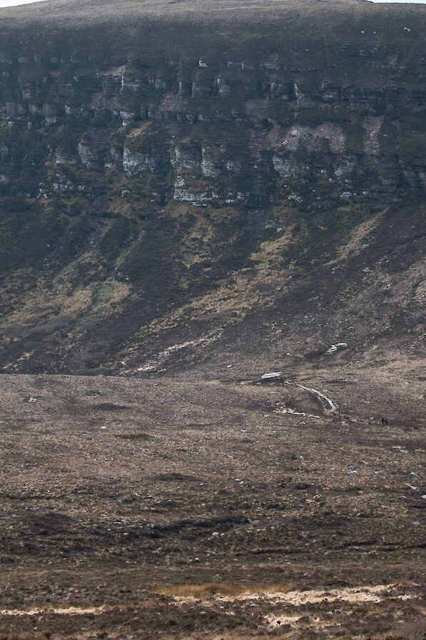 The Dwarfie Stane in the shadow of the Dwarfie Hamars