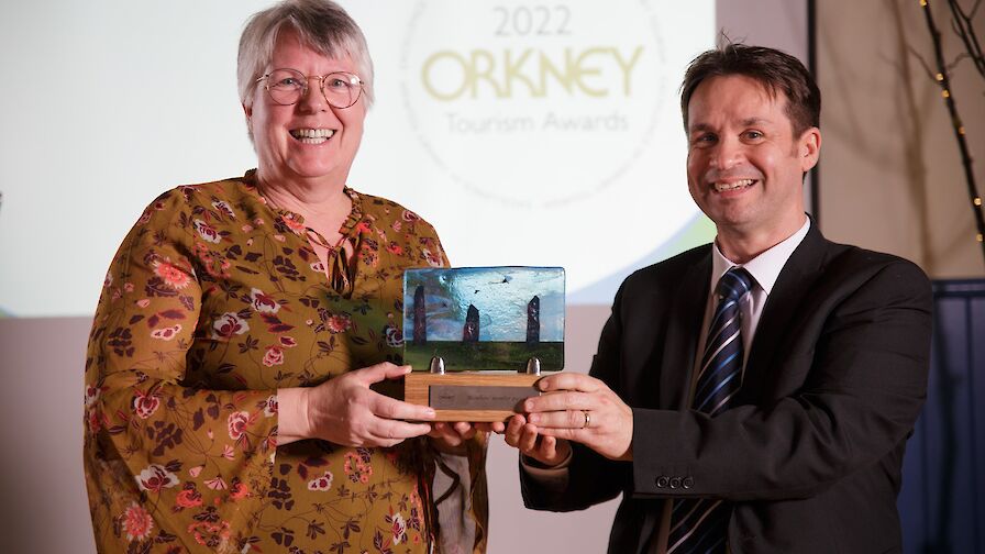 Jackie Sinclair collecting the Members' Member Award on behalf of the Sanday Business Forum from NorthLink Ferries' Magnus Dixon