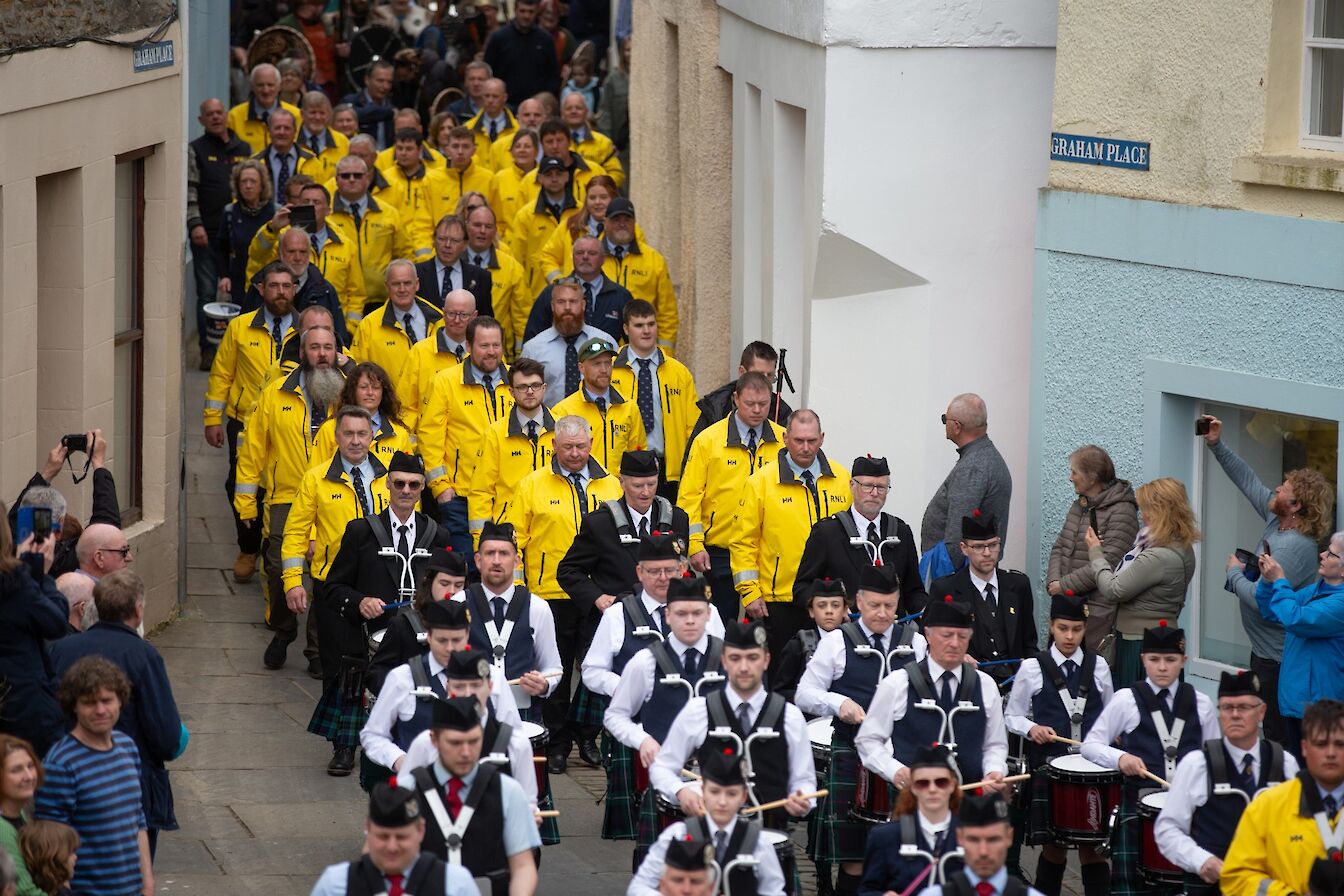 Some of Orkney's RNLI volunteers at the Stromness RNLI 200 Mass Pipe Band Parade, Orkney