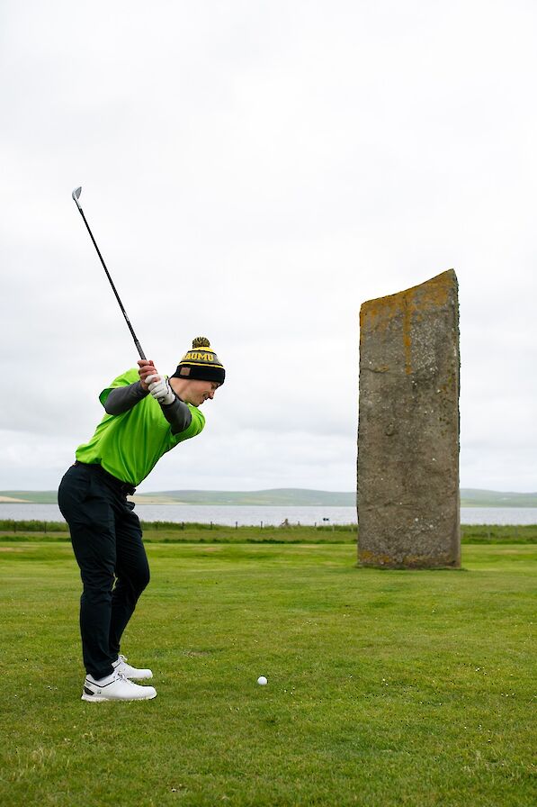 Golfer Michael Schinkel at the Standing Stones of Stenness, Orkney